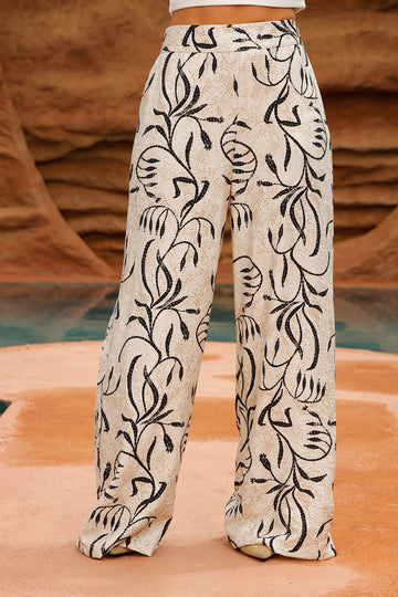 Pantalón DF06138 para mujer amplio de tiro alto con estampado botánico dyaboo color negro 1