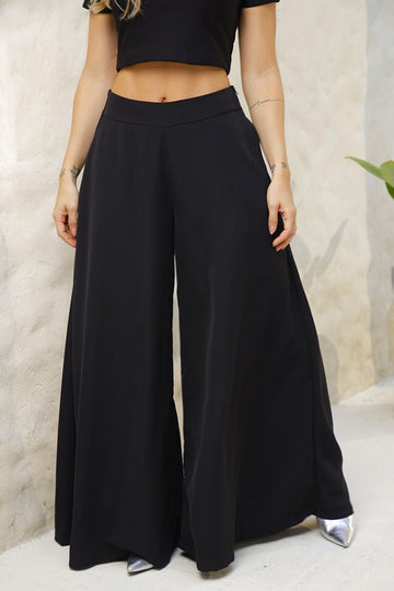 Pantalón Palazzo DF06104 silueta suelta para mujer, elaborado en poliéster dyaboo negro 1