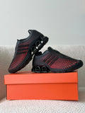 Tenis negro y rojo para hombre