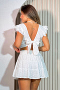 Conjunto blusa cuello V y falda corta en ojalillo DF14016 dyaboo crudo blanco