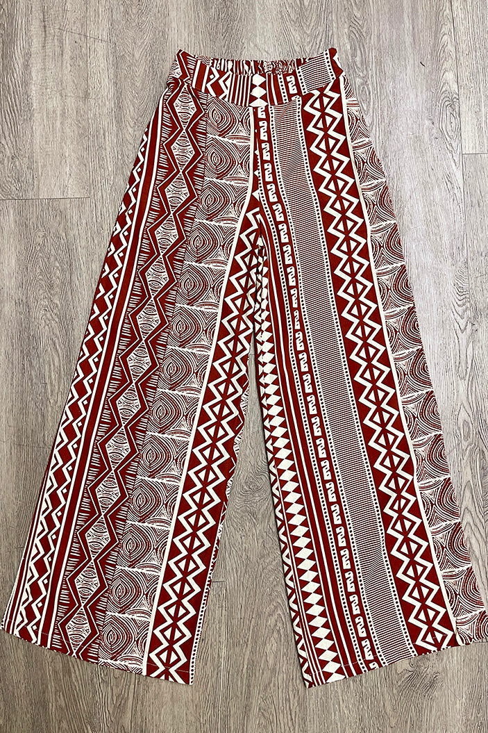 Pantalón DF06129 palazzo de tiro alto con estampado dyaboo color terracota