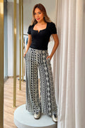 Pantalón DF06129 para mujer palazzo de tiro alto con estampado dyaboo color negro 1
